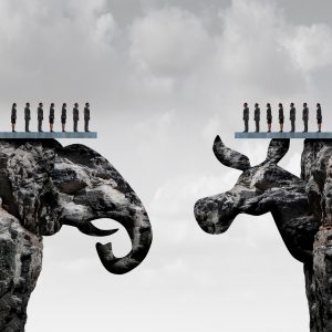 Two groups of people standing on opposing cliffs